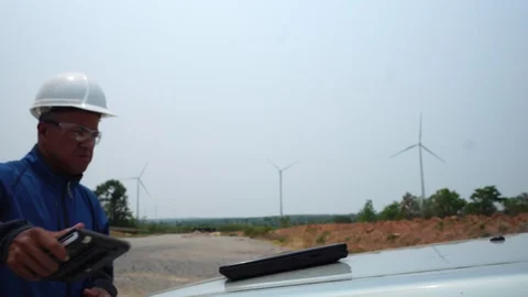 Engineer Inspects Wind Turbines  Stock Footage 127921279