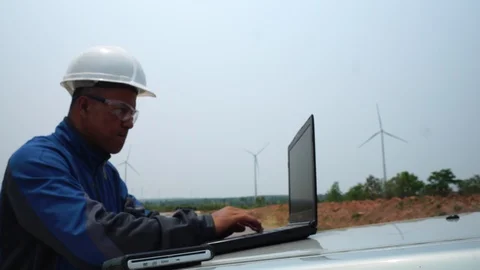 Engineer Inspects Wind Turbines  Stock Footage 127921301