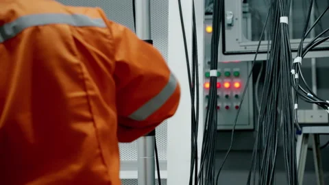 The engineer is installing the electrical system in the control room, Stock Footage 164467805