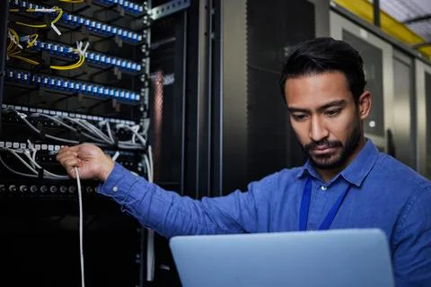 Engineer laptop, server room and cable connection for software update or Stock Photos