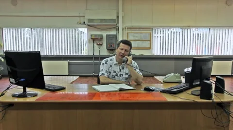 Engineer At Large Table On Phone Stock Footage 8659444