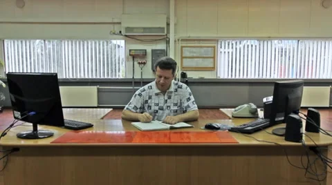 Engineer At Large Table Writes Stock Footage 8659443