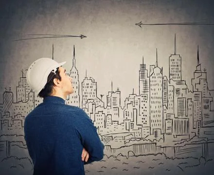 Engineer looking at city project Stock Photos