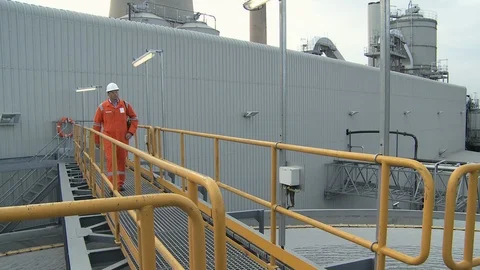 Engineer looking at control panel Stock Footage 136553816