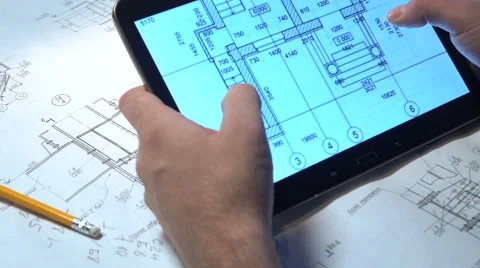 Engineer looking drawings on the tablet. Stock Footage 59507820
