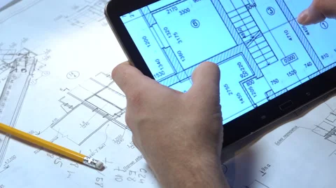 Engineer looking drawings on the tablet. Stock Footage 59507916