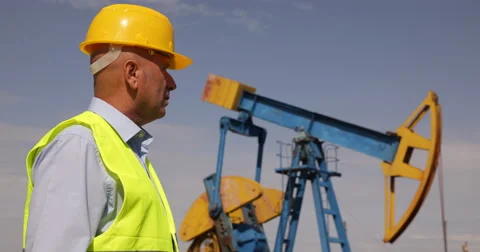 Engineer Looking Oil Field Supervise Extracting Pump Management Experience Job Stock Footage 51862997