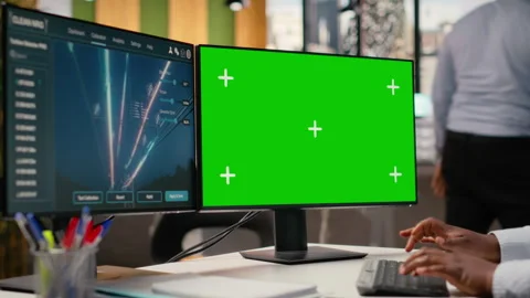 Engineer looking at power lines analytics dashboard on isolated screen PC Stock Footage 315611418