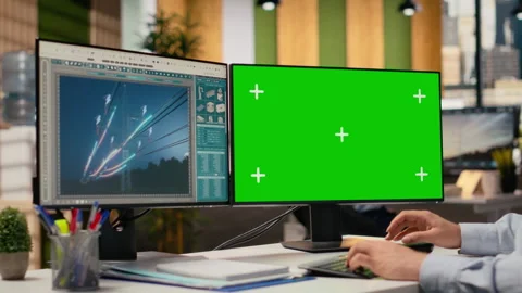 Engineer looking at power lines analytics dashboard on isolated screen PC Stock Footage 315614003