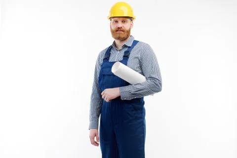 The engineer looks into the camera on a white background Stock Photos