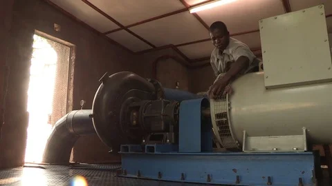 Engineer maintaining a hydro power generator Video stock 84716495