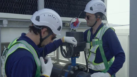 Engineer maintenance hvac cooling tower technician safety inspection and re.. Stock Footage 335193660