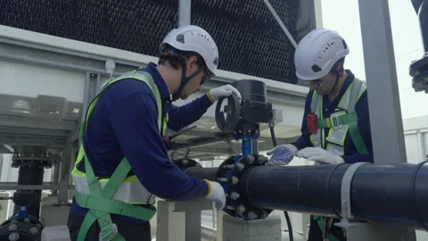 Engineer maintenance hvac cooling tower technician inspection repair valve .. Stock Footage 335193954