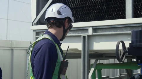 Engineer maintenance hvac cooling tower technician industrial safety inspec.. Stock Footage 335194275