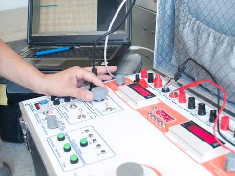 Engineer makes maintenance of power network automation Stock Photos