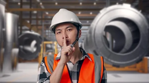 Engineer Making Shh Gesture at Heavy Factory Stock Footage 340820006