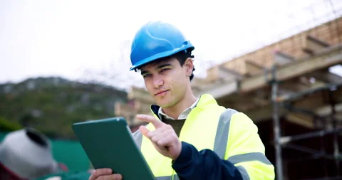 Engineer, man and inspection on construction site with tablet, plan and typing Vídeos de archivo 337034194
