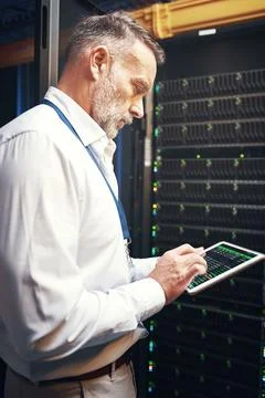 Engineer, man and server room inspection with tablet for CPU usage, track a.. Stock Photos