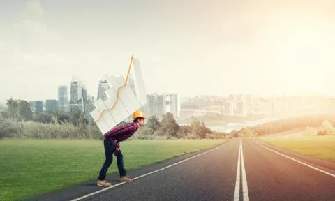 Engineer man carry progress graph Stock Photos