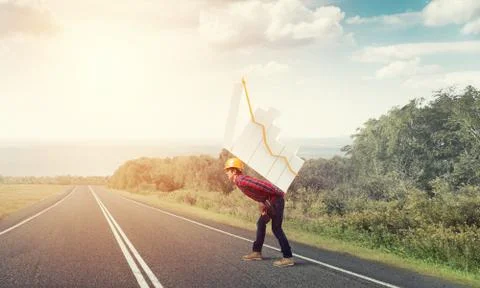 Engineer man carry progress graph Stock Photos