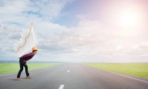 Engineer man carry progress graph Stock Photos