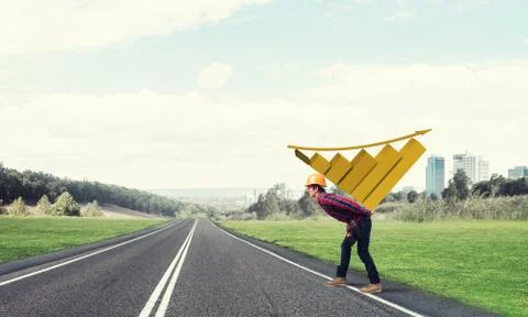 Engineer man carry progress graph Stock Photos