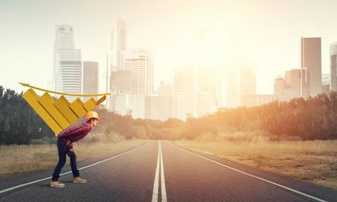Engineer man carry progress graph Stock Photos