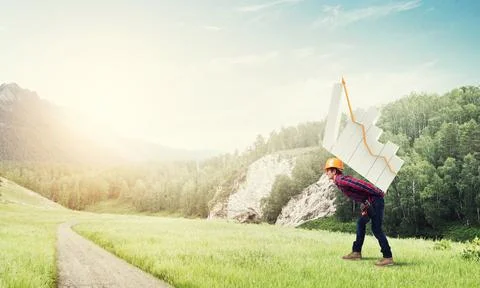 Engineer man carry progress graph Stock Photos