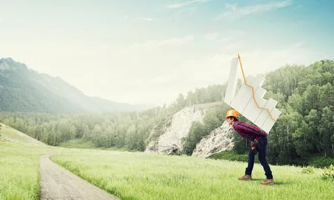 Engineer man carry progress graph Stock Photos