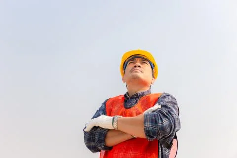 Engineer man checking and planning project at construction site Фото