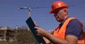 Engineer Man Clipboard Take Notes Verify Project Calculations Construction Site 4k or 4k+ Resolution
