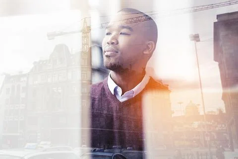 Engineer man, double exposure and thinking by crane, cityscape and lens flare 스톡 사진