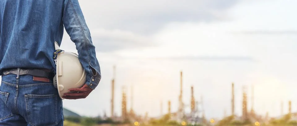 Engineer man hands holding hardhat white work helmet hard hat for Civil Con.. Stock Photos