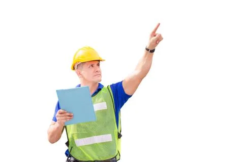 Engineer man in hard hat holding clipboard checklist and pointing to the sky Fotos de archivo