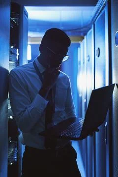Engineer, man or laptop with thinking in server room for console access, po.. Stock Photos