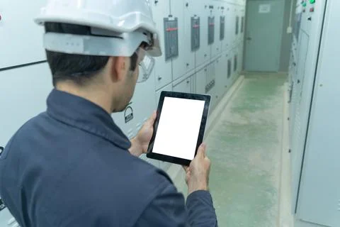 An engineer man or worker, people using a tablet device with blank screen spa 스톡 사진