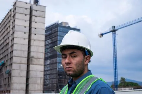 Engineer man portrait in construction site at afternoon Stock Photos