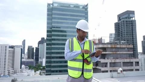 Engineer man success work on a rooftop. Видео 280732588