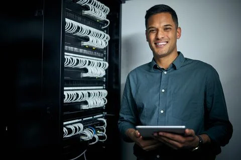 Engineer man, tablet and portrait in server room with smile, coding and check Stock Photos