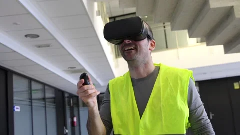 Engineer man wearing virtual reality glasses Stock Footage 256781941