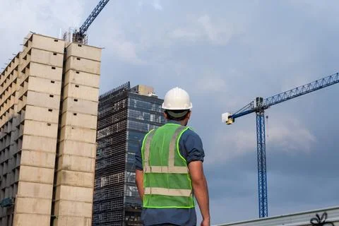 Engineer man working and looking construction site Stock Photos