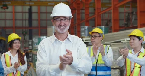 Engineer manager and team standing and hand clapping to congratulate success job Stock-Footage 241900242