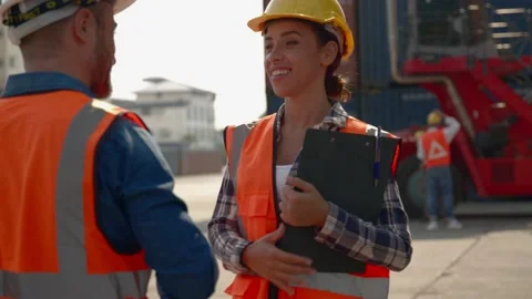 Engineer manager and worker team greeting by touching hands Stock Footage 173694289