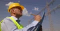Engineer Manager Check Plans Looking High Voltage Energy System Installation 4k or 4k+ Resolution