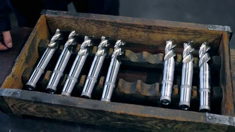 The engineer measures the part with a caliper. High-precision work. Factory for Stock Footage 171775097