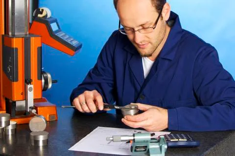 Engineer measuring with caliper Foto stock