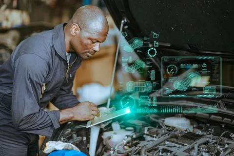 Engineer Mechanic using Advance technology software application check tunin.. Fotos de archivo