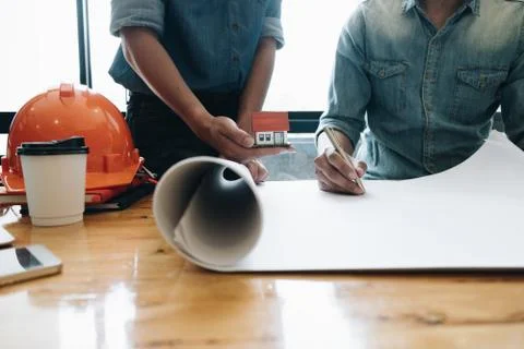 Engineer meeting for architectural construction project. working with partner Stock Photos