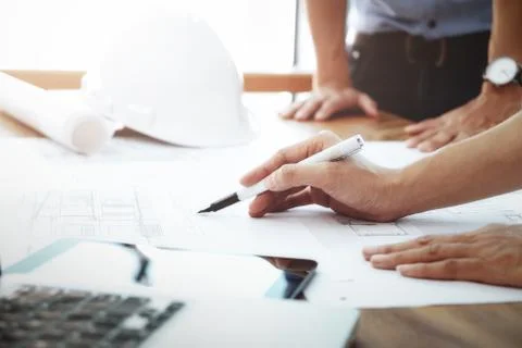 Engineer meeting for architectural project. working with partner Stock Photos