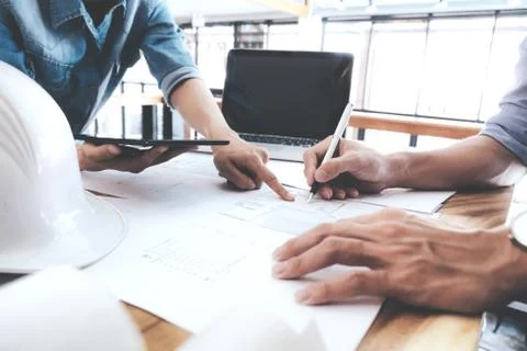 Engineer meeting for architectural project. working with partner Stock Photos